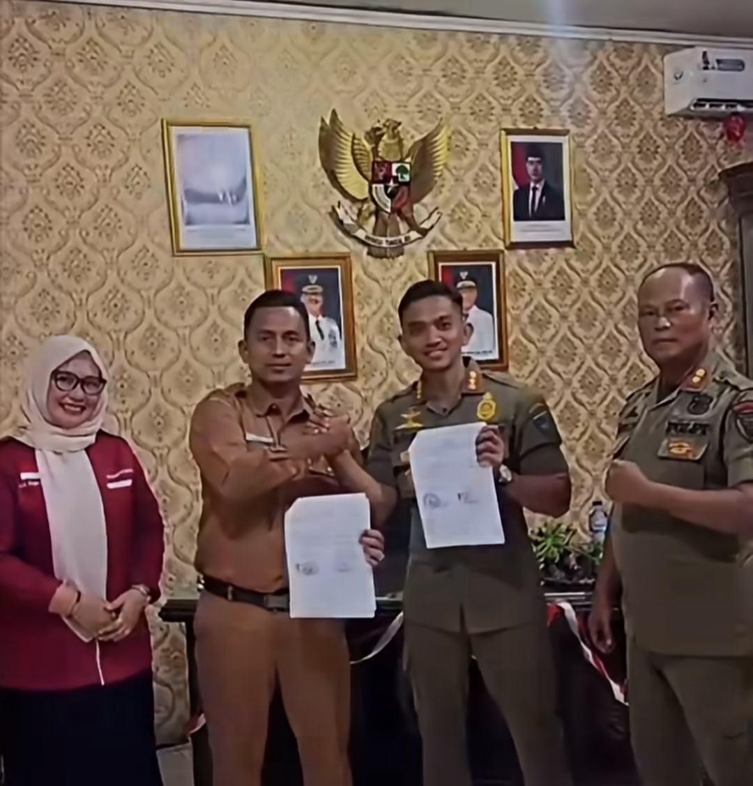 Kasatpol PP Pessel Perkuat Pembinaan Disiplin Pelajar melalui MoU dengan SMKN 1 Painan